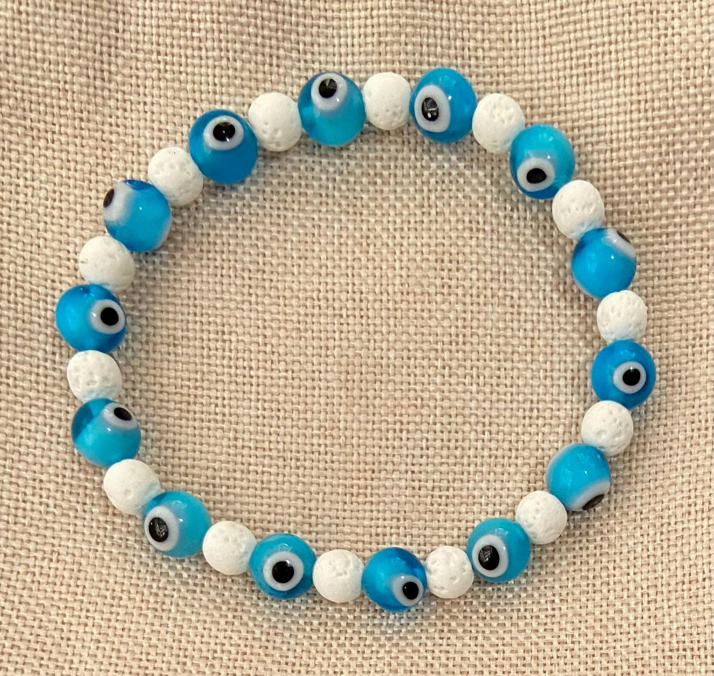 8mm Light Blue Glass Evil Eye and 6mm Genuine White Lava Stone Bracelet, handmade stretch beaded bracelet for spiritual healing protection
